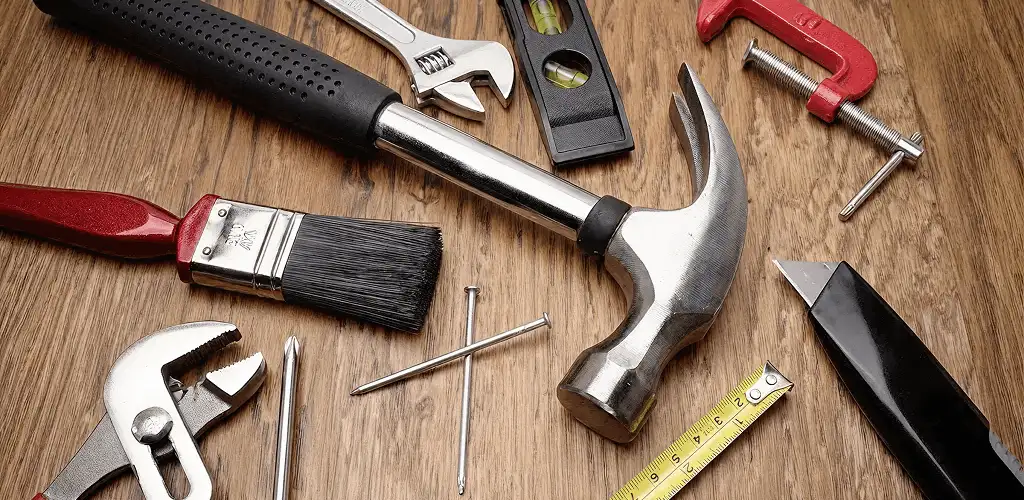 Handyman tools laid out for home repair and maintenance work in Bloomington, IN